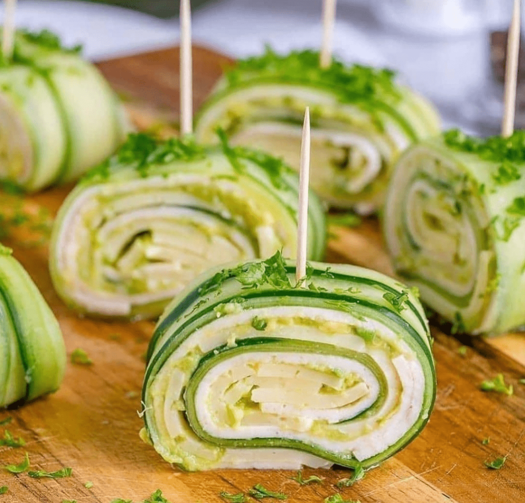 keto cheese cucumber roll ups, cucumber rolls cream cheese, salmon cream cheese cucumber rolls, ham cream cheese cucumber roll ups, cheese cucumber rolls, cream cheese and cucumber rolls, cucumber cheese rolls, cucumber rolls with cream cheese, cucumber rolls with cream cheese and dill, goat cheese cucumber rolls,